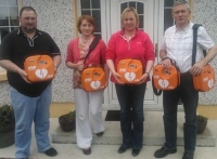 Members of the Loughmore/Castleiney Defibrillator Group in Tipperary Receiving five AEDs