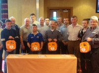 Members from the Irish Tug of War Association receiving 4 X AEDs and Training From Eiremed 